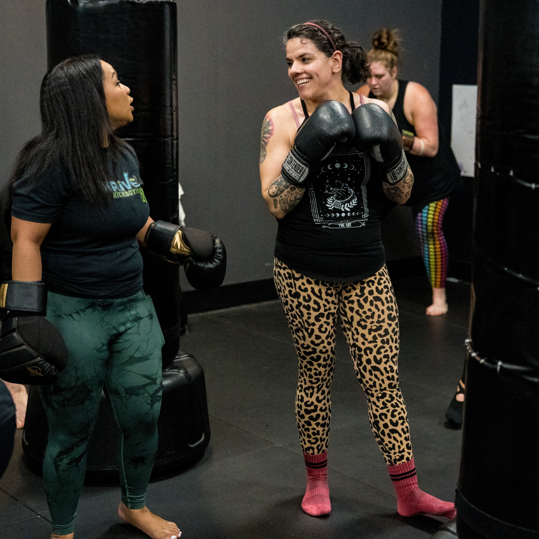 Thrive Kickboxing instructors welcoming new student at Thrive Kickboxing Craig Road Las Vegas
