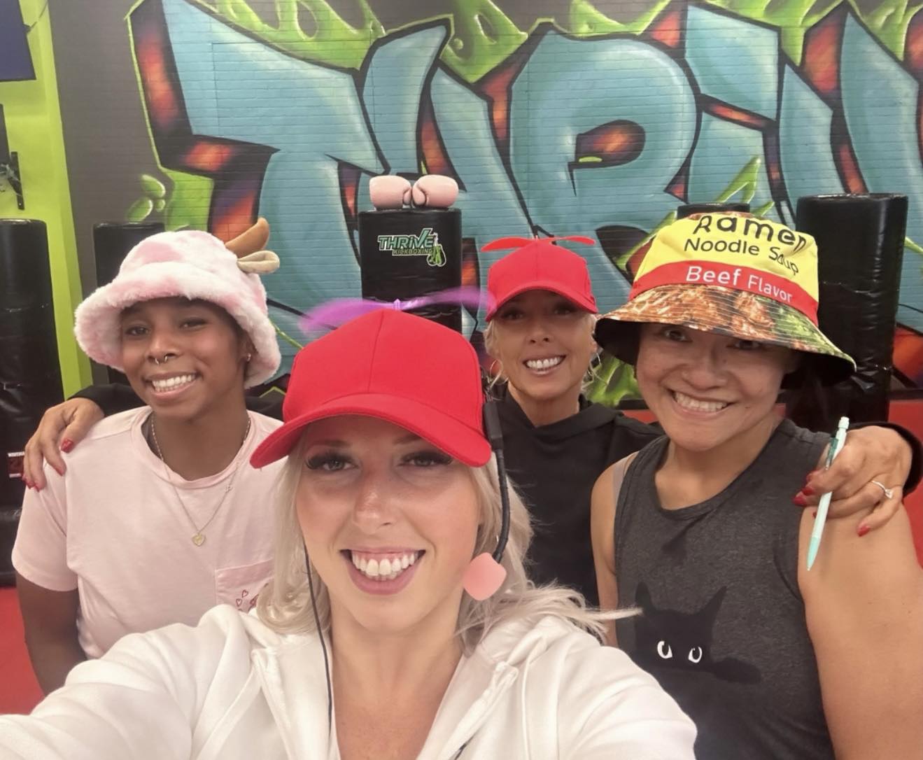 Thrive Kickboxing Henderson members smiling together after class